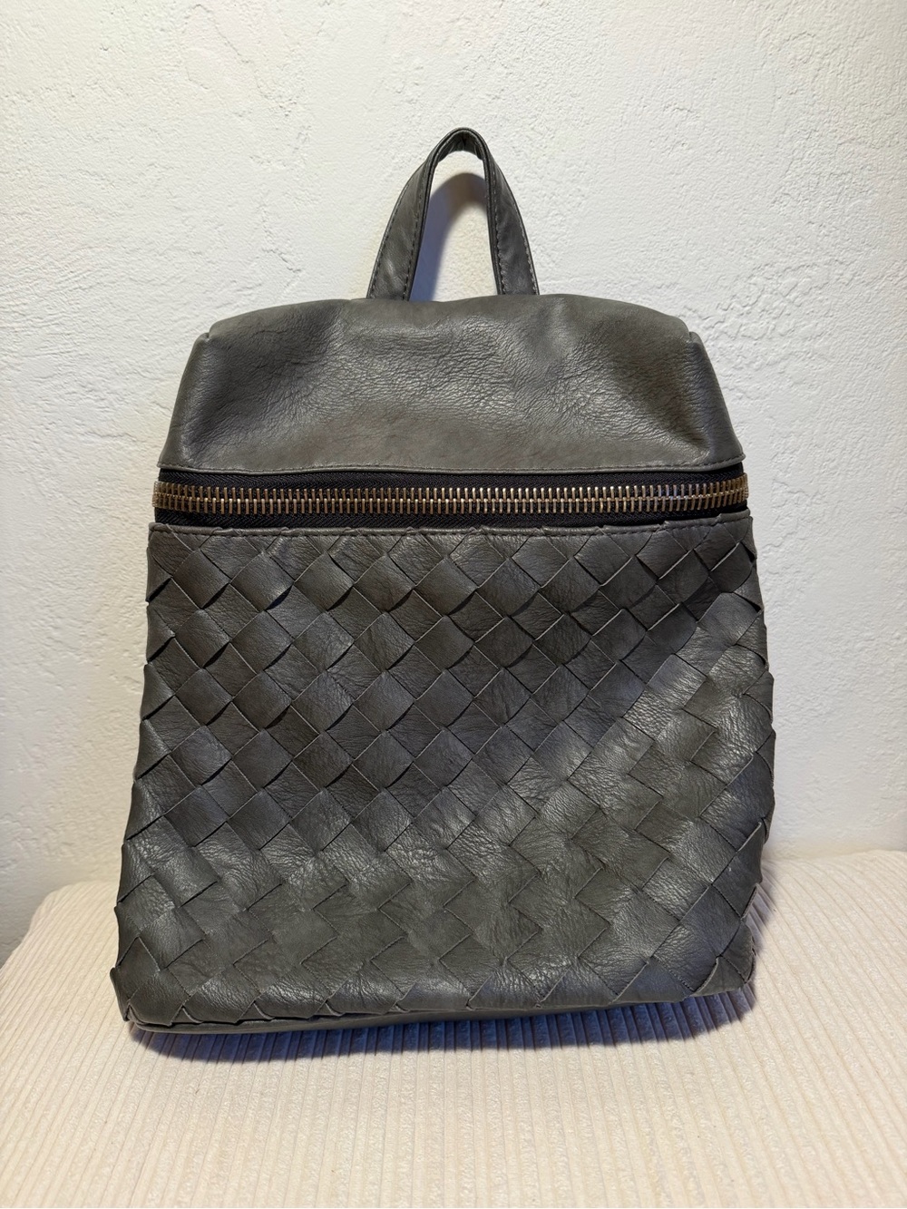 Madison West Woven Leather Backpack